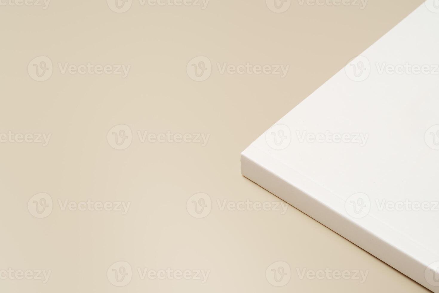 Stack of blank paper on beige background photo