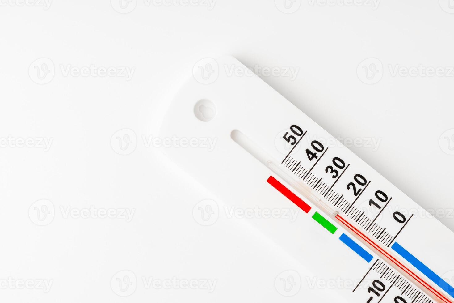 White Thermometer and Hygrometer Displaying Room Temperature and Humidity photo