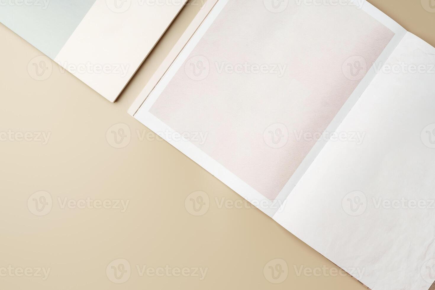 Stack of blank paper on beige background photo