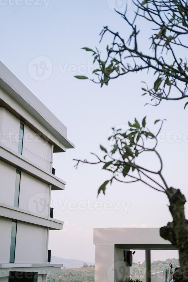 Side view of a hotel building showcasing its modern architecture and clean lines photo