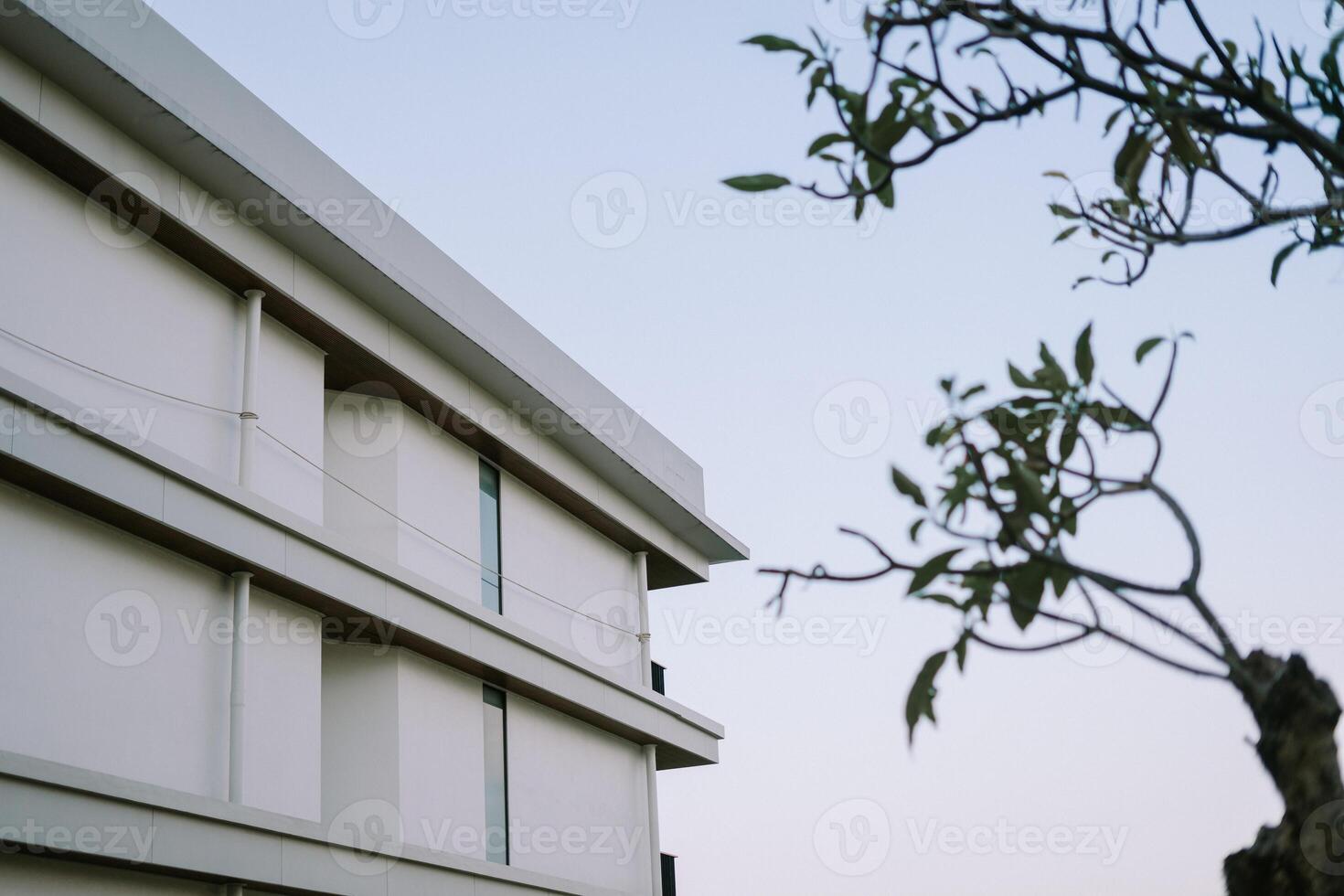 Side view of a hotel building showcasing its modern architecture and clean lines photo
