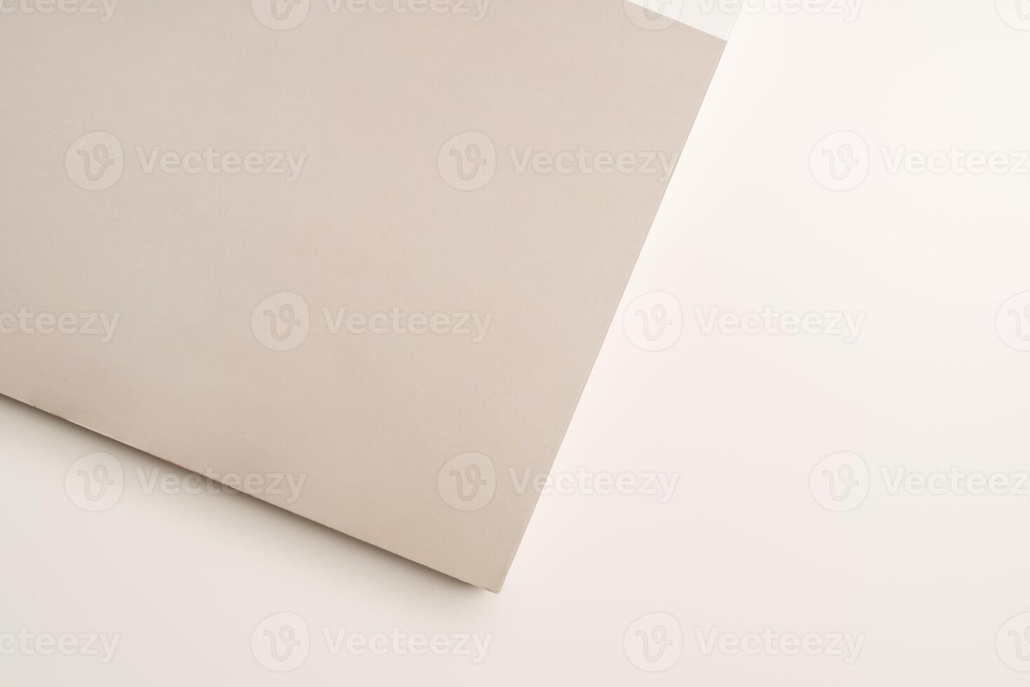 Stack of blank paper on beige background photo