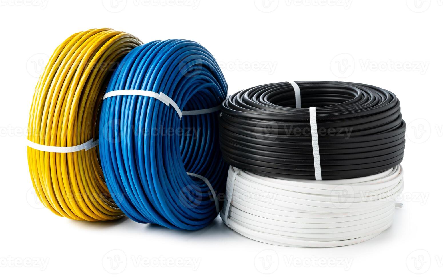 Four Spools of Electrical Wire in Yellow, Blue, Black, and White Colors. A Close-Up Photo of Four Spools of Electrical Wire, Each Wound in a Different Color.