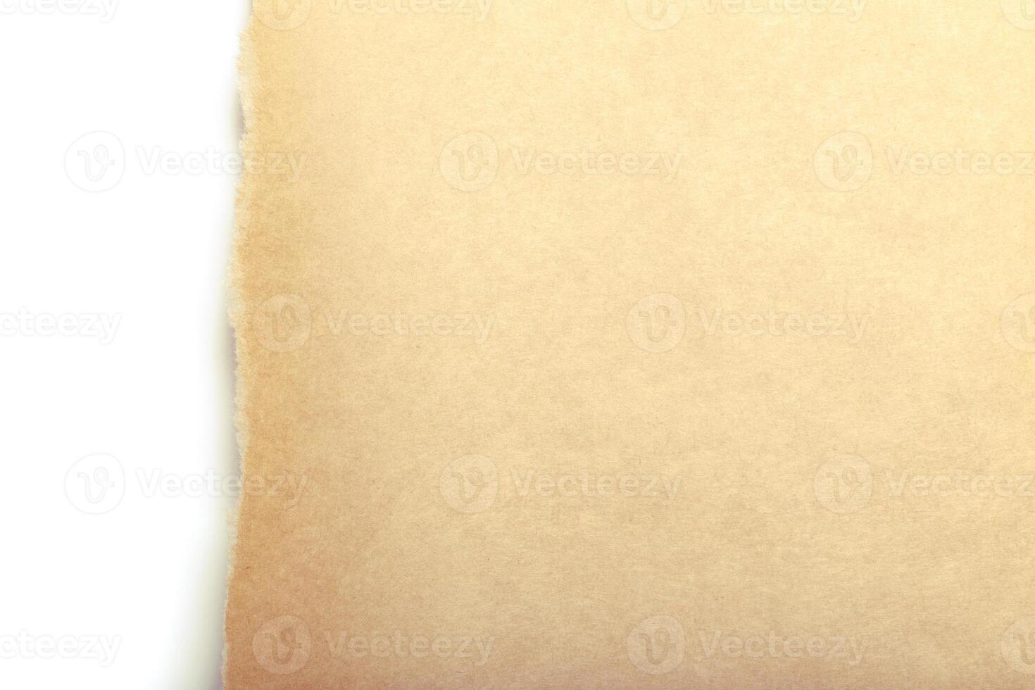 Brown package paper torn to reveal white panel photo