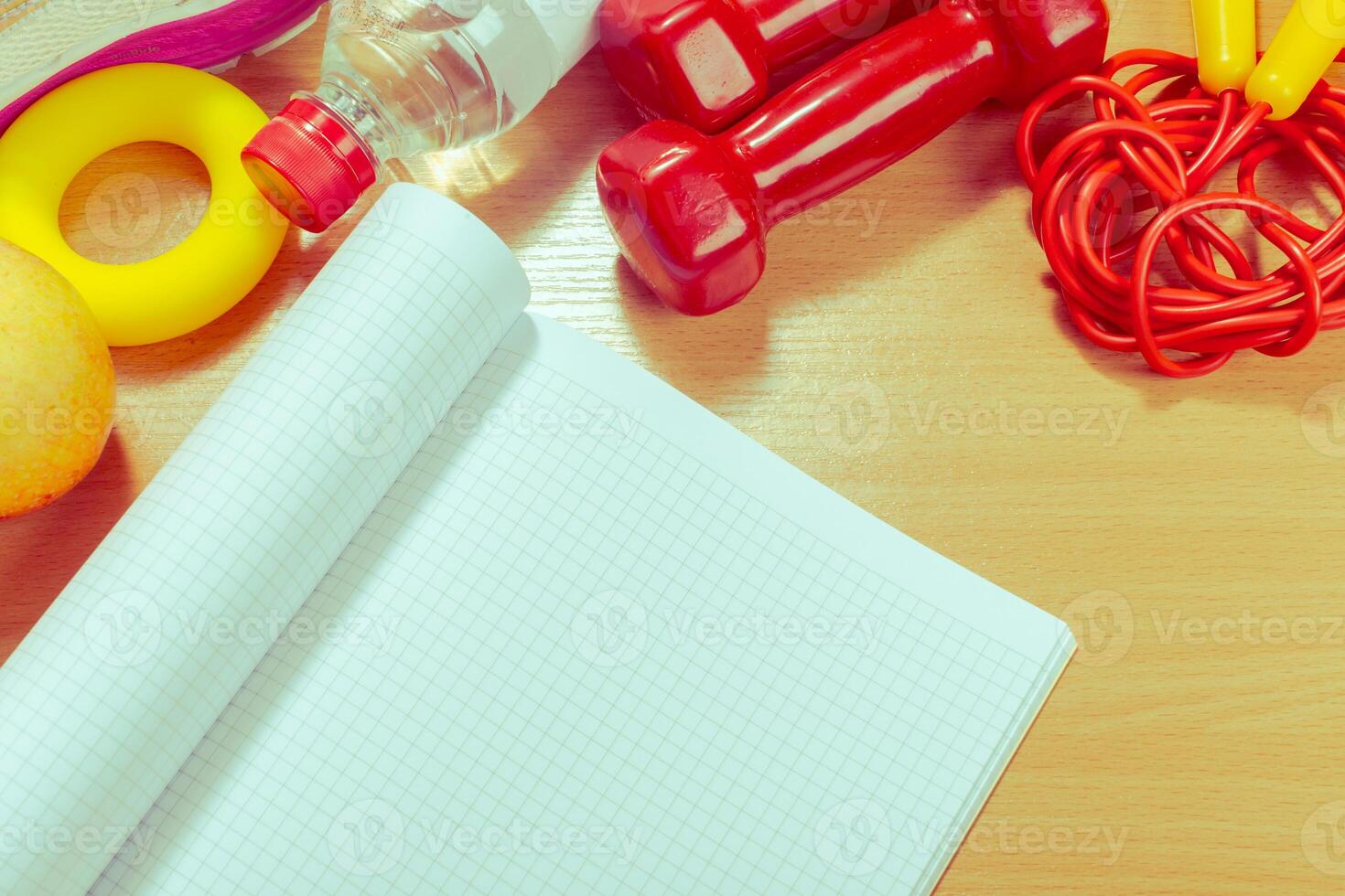 Workout plan and sports equipment photo