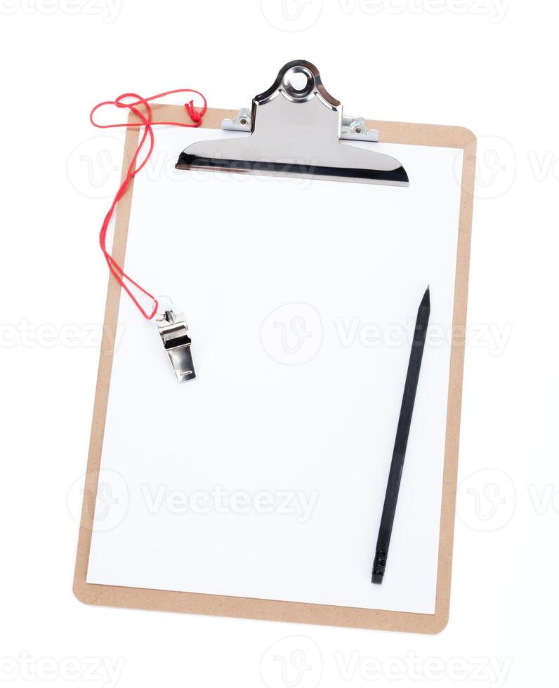 A blank clipboard and a coaches whistle with copy space photo