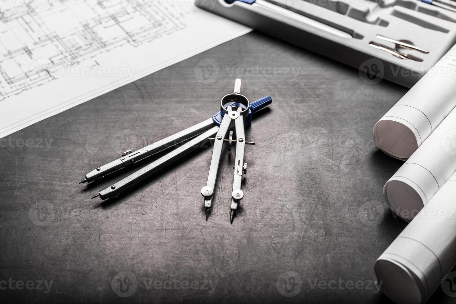 Construction planning drawings on black background photo