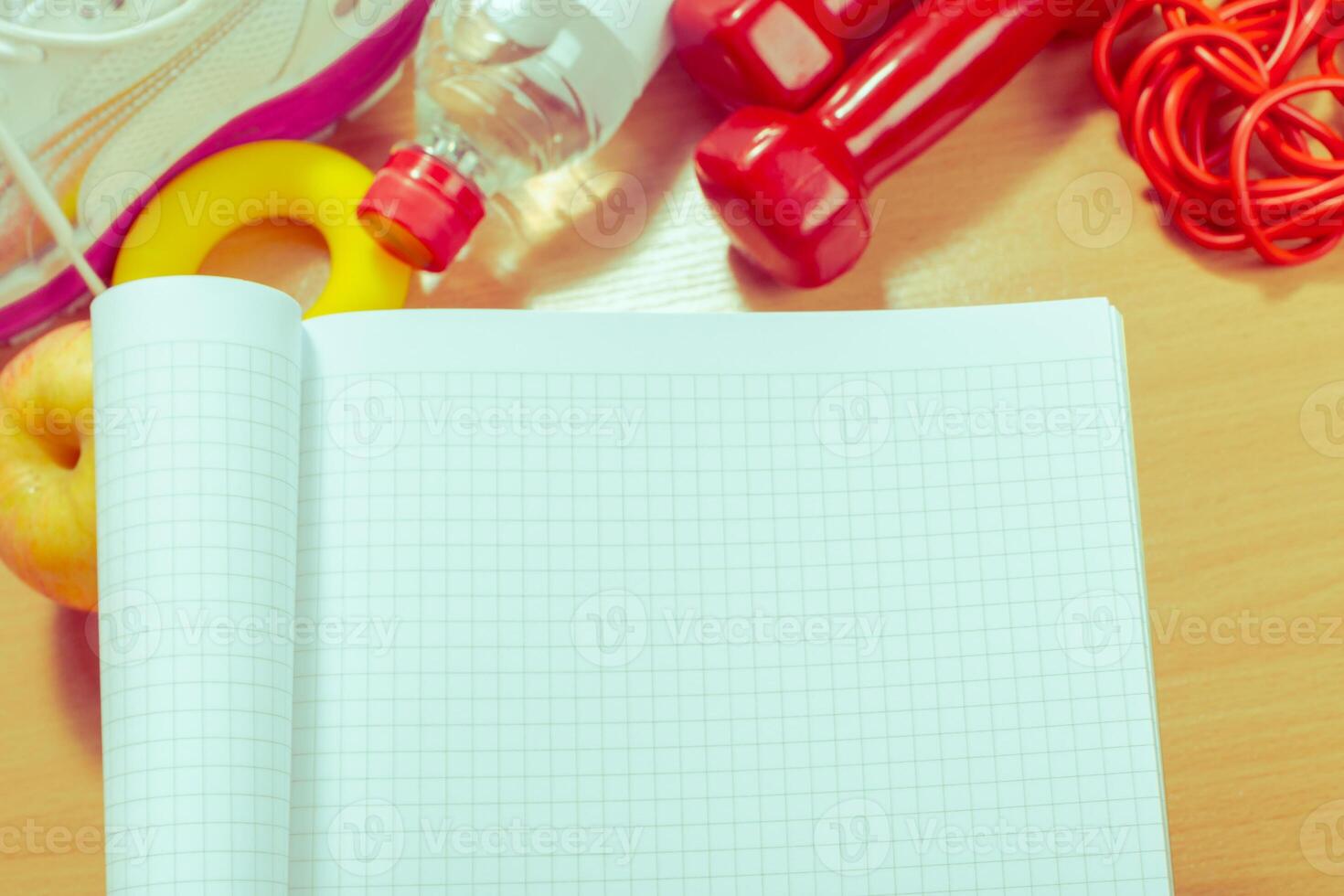 Workout plan and sports equipment photo