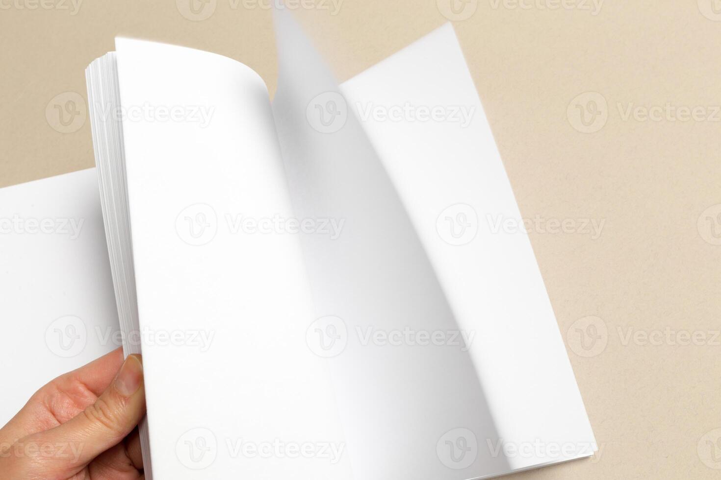 Blank paper on wood table photo