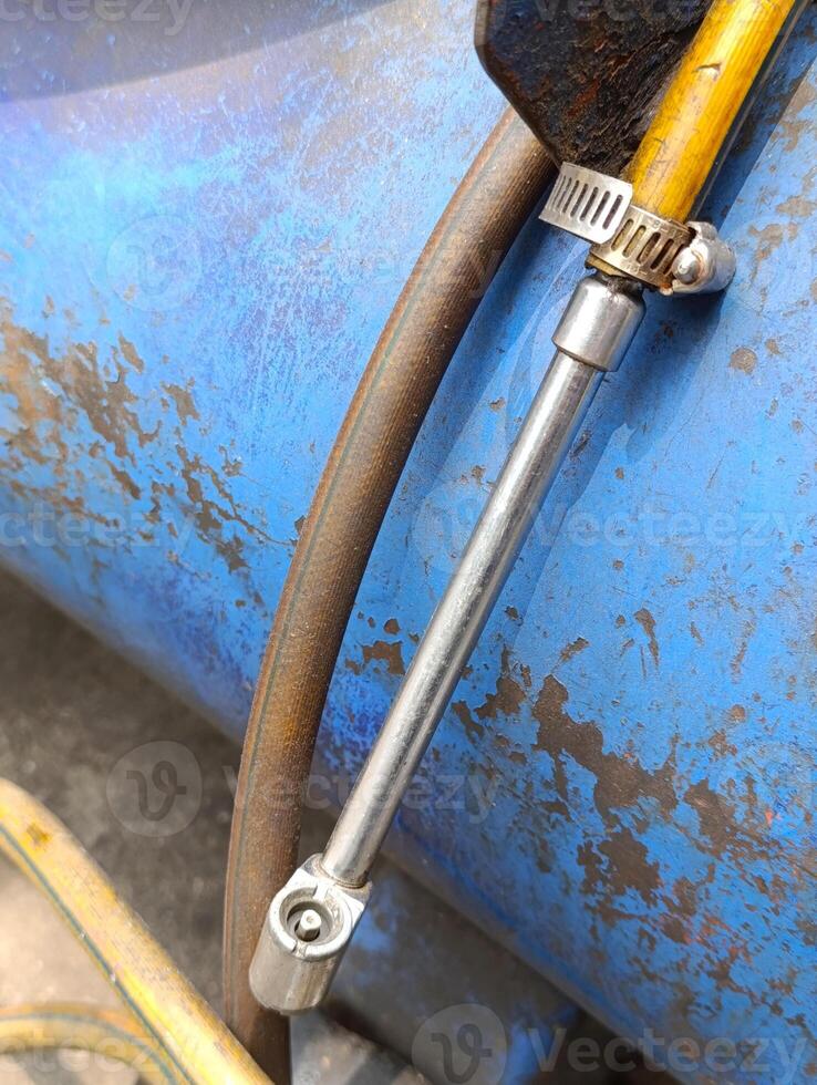 Close up of tire chuck when not in use to inflate vehicle tires photo