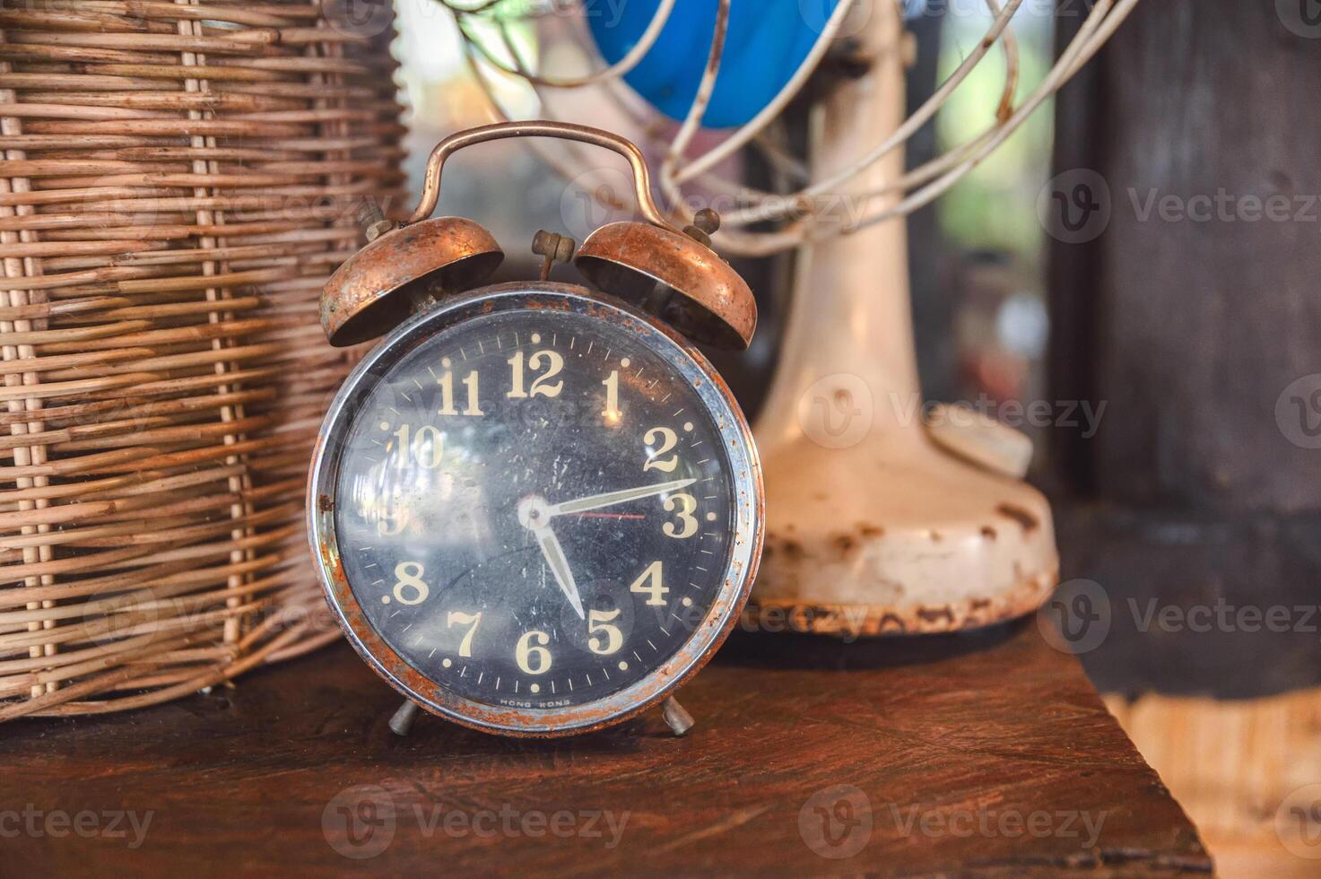 Retro alarm clock decorative on table photo