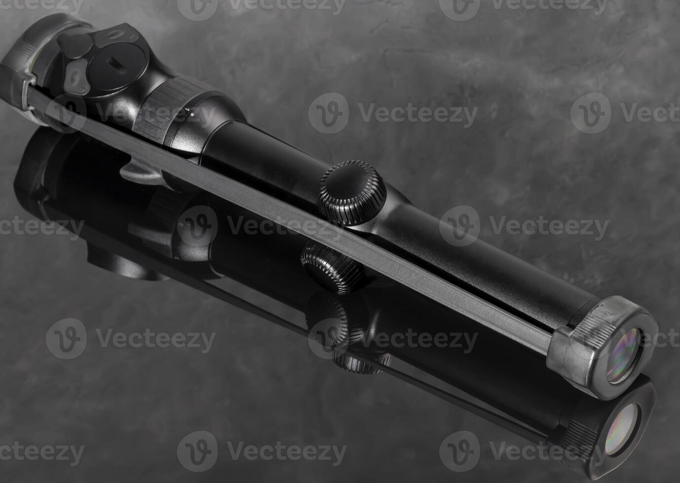Laser sight for rifle close up. Optics for firearms. photo