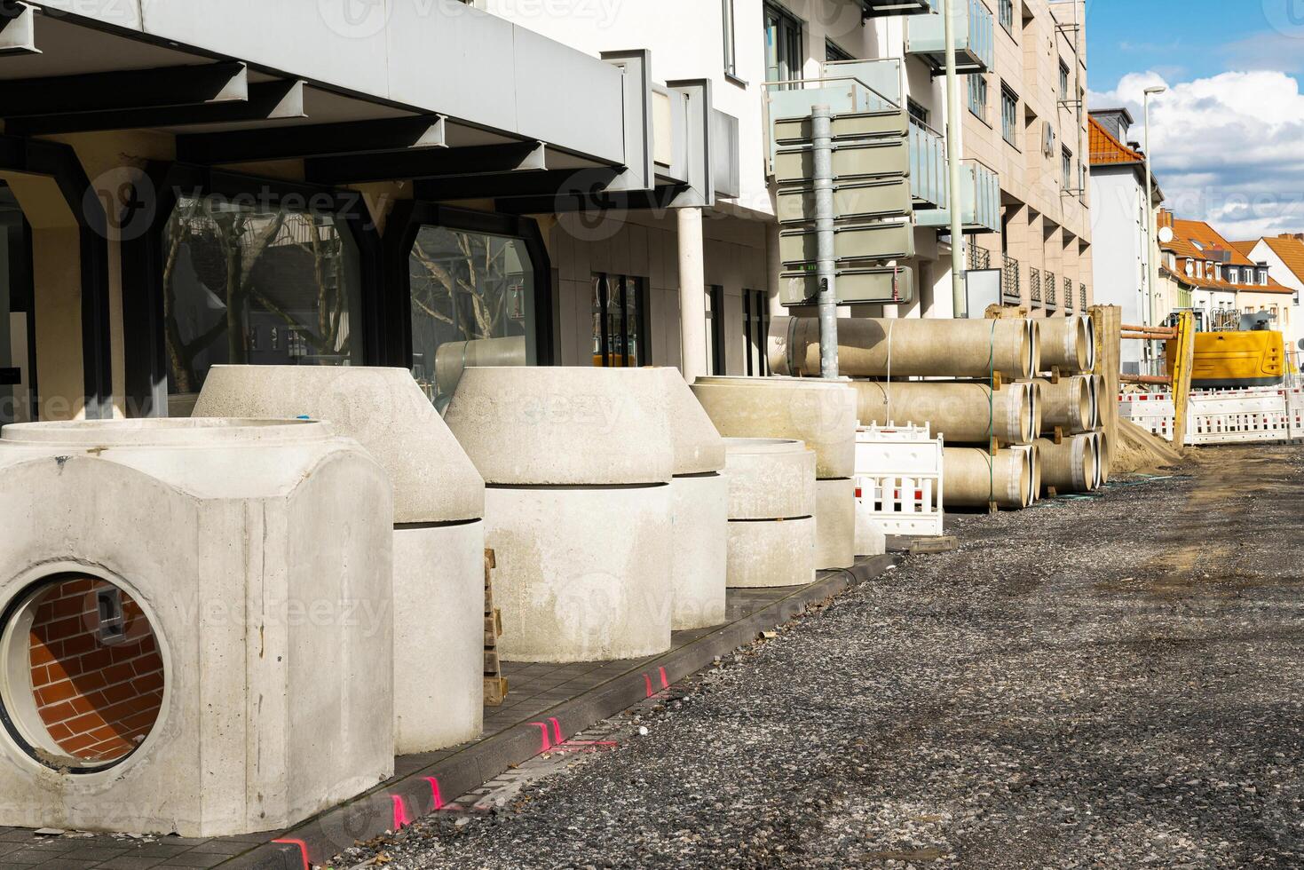 Concrete building structures and pipes at the construction site. photo