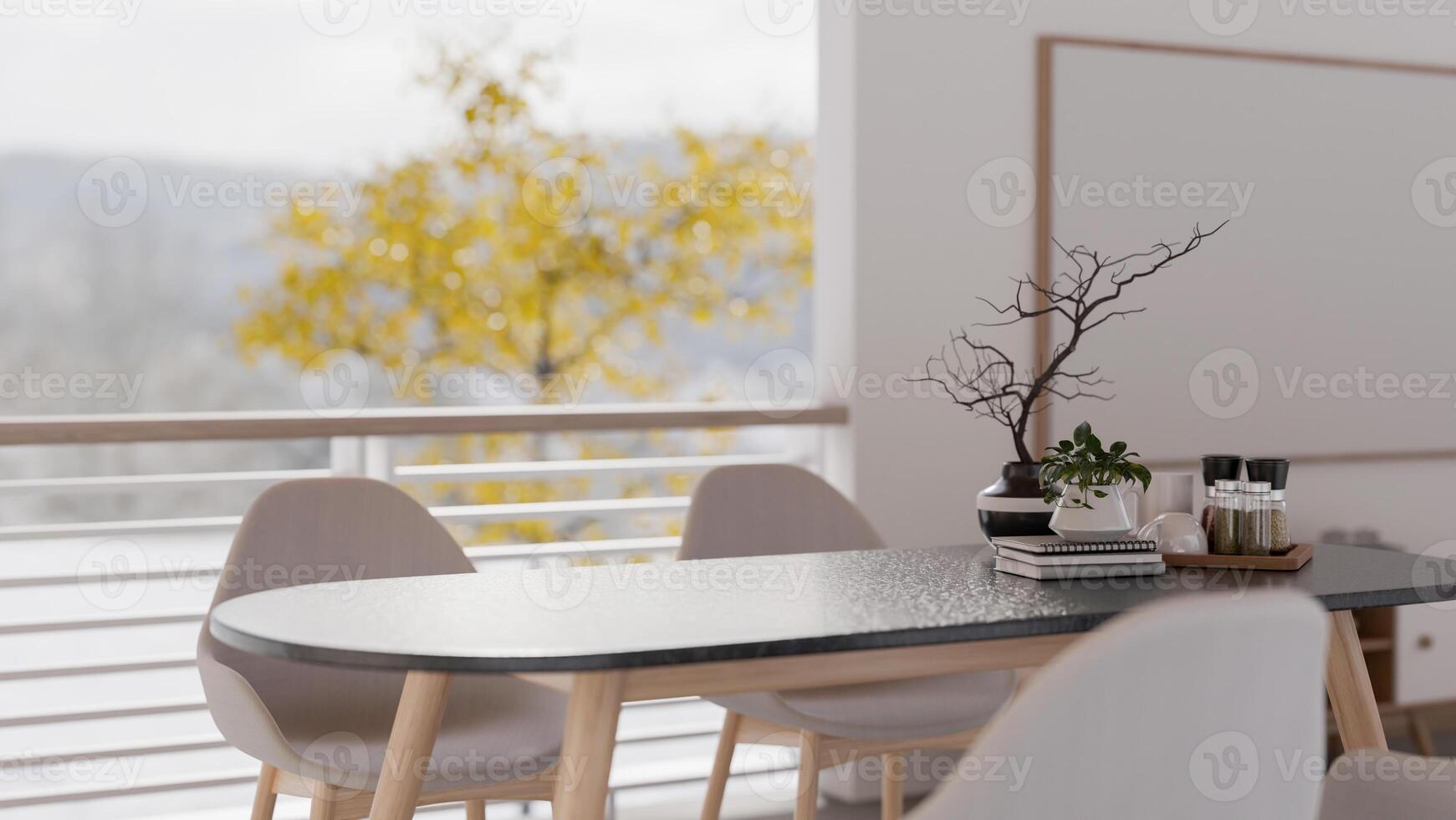 A close-up of a modern dining table by the window in a contemporary white dining room. photo