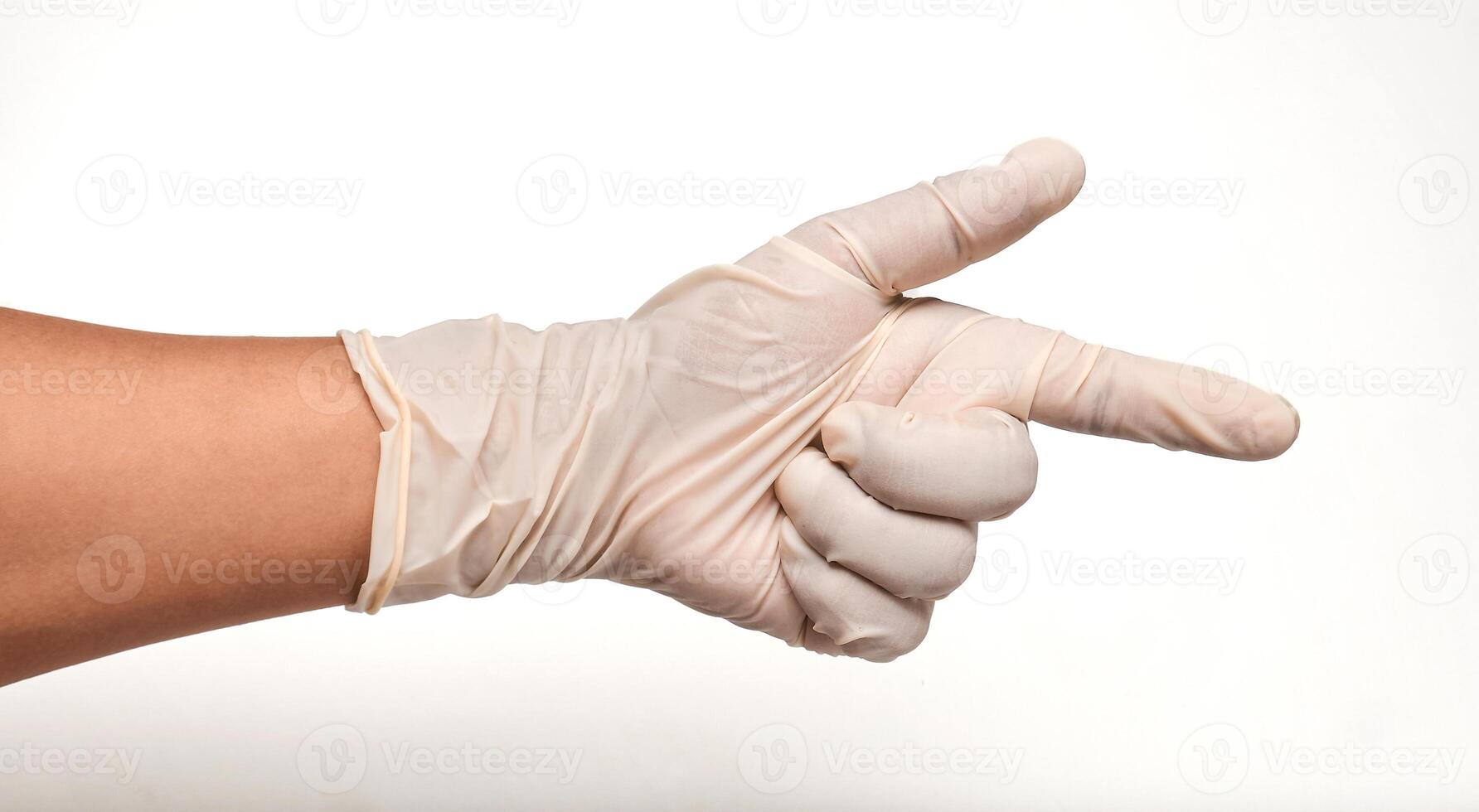 Latin doctor's hand in glove pointing on a white background. photo