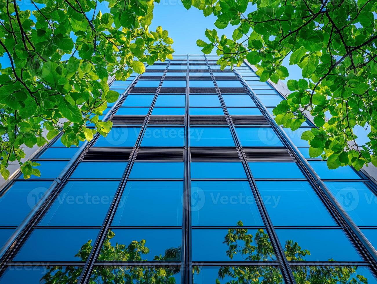 Eco-friendly building in the modern city. Office building with green environment. photo