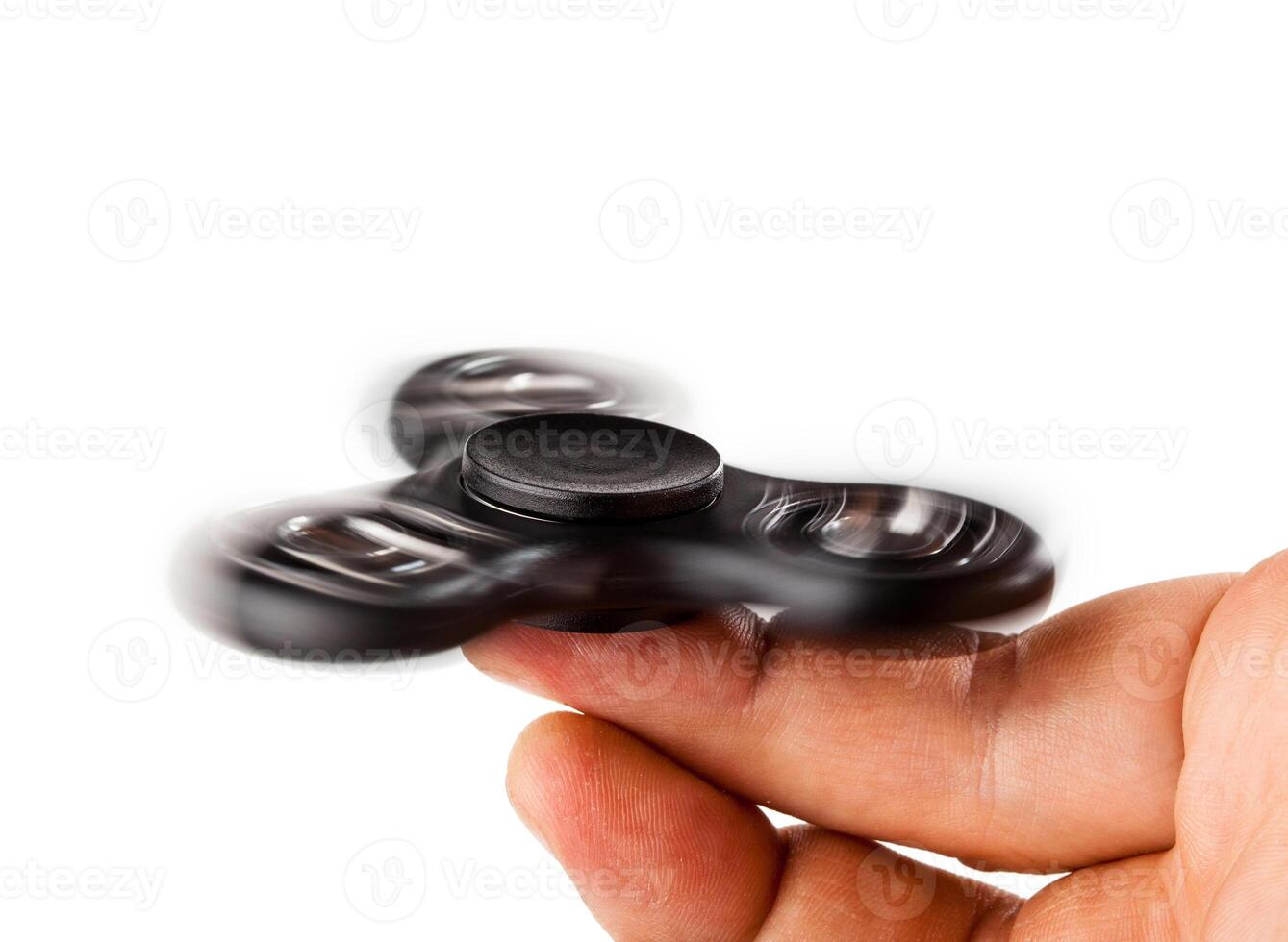 Palying with a Black Fidget Spinner photo
