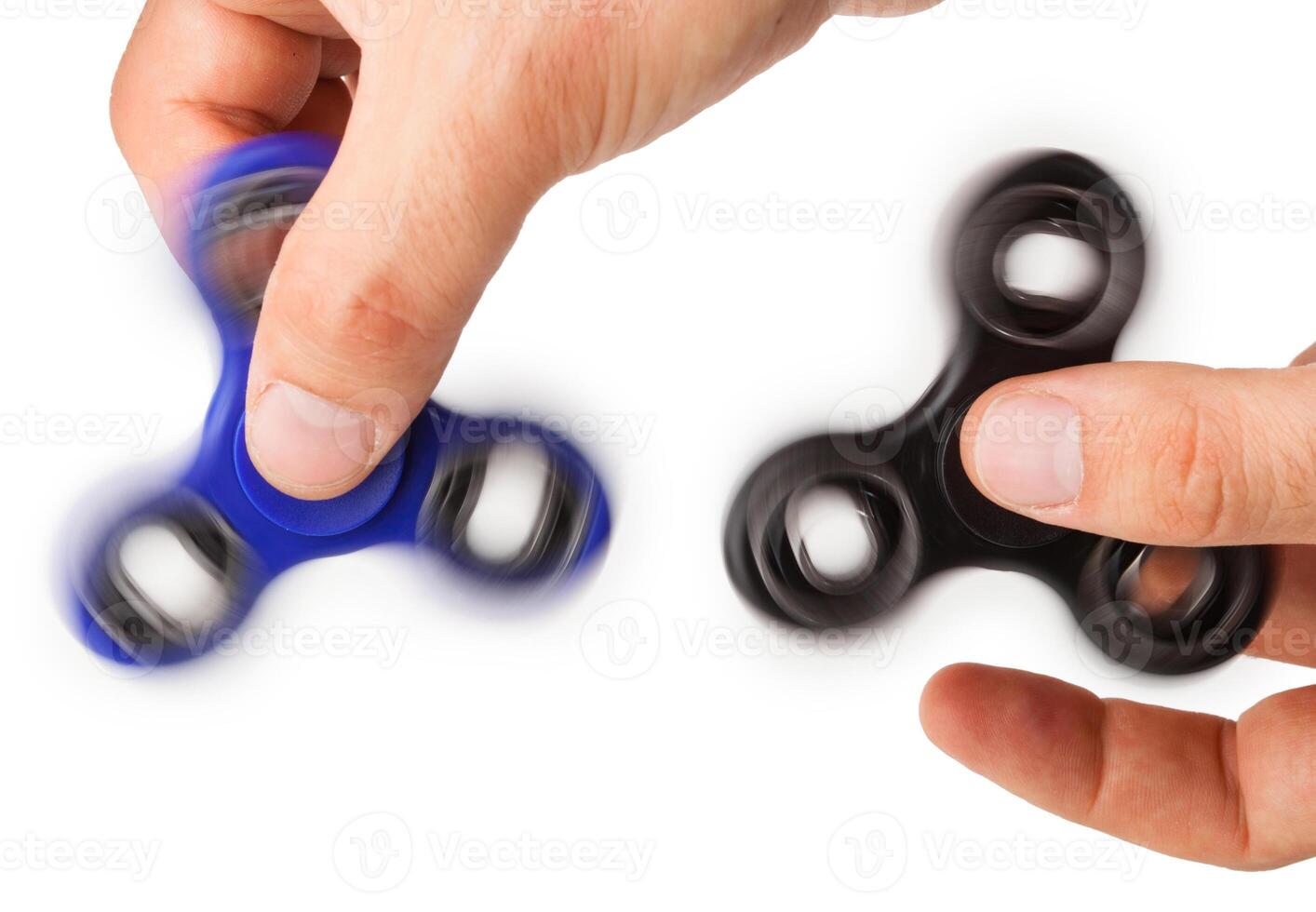 Playing with two Fidget Spinner photo