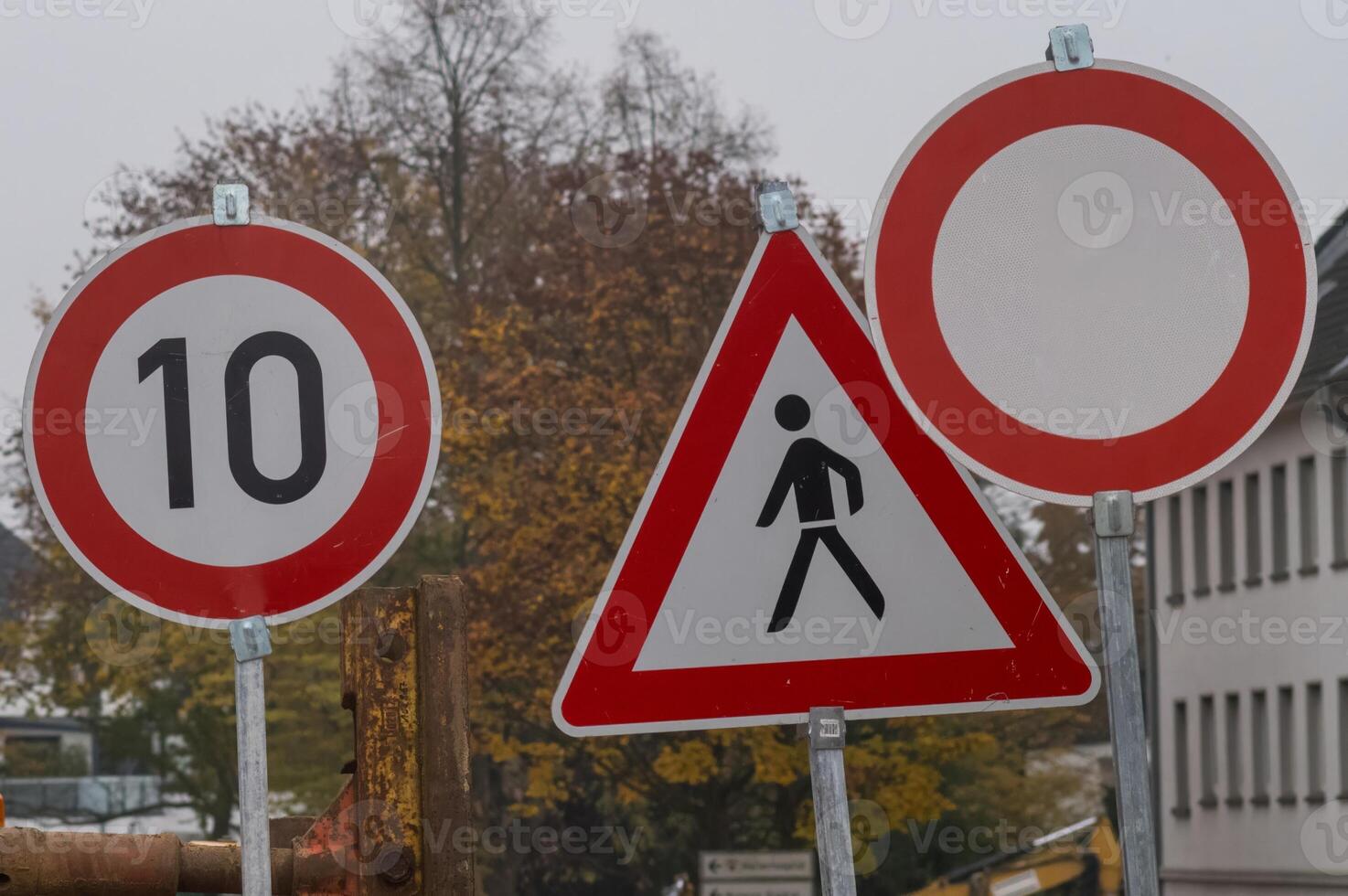 Speed limit, pedestrian crossing and no vehicles road signs showing traffic regulations photo