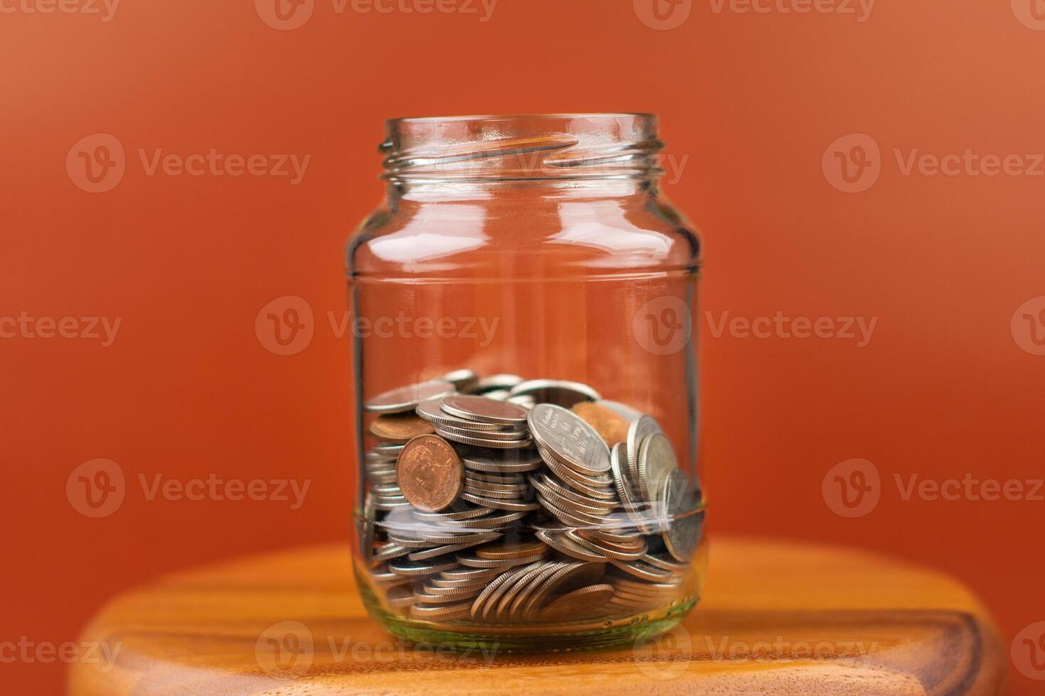 Saving money in a piggy bank creates a good financial plan, financial income and financial investment, cash flow. photo