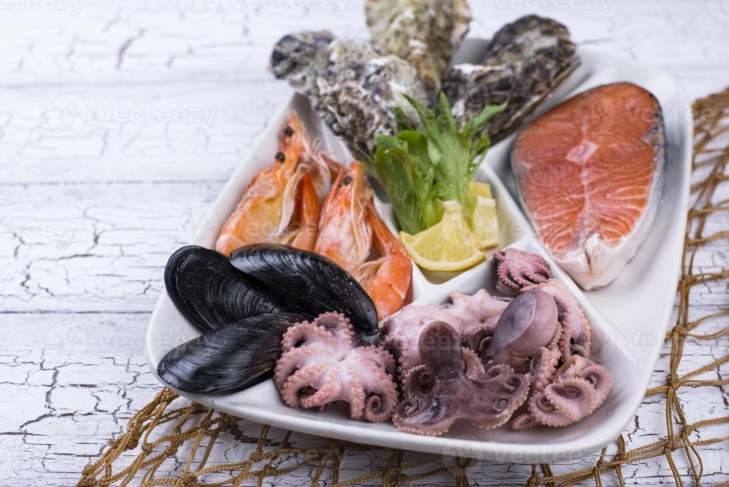 Set of various seafood in plate photo