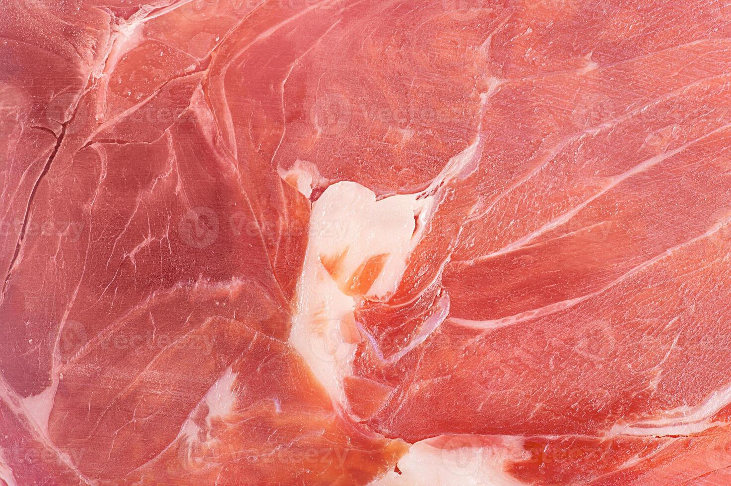 Hamon meat thin slice as macro photo background.