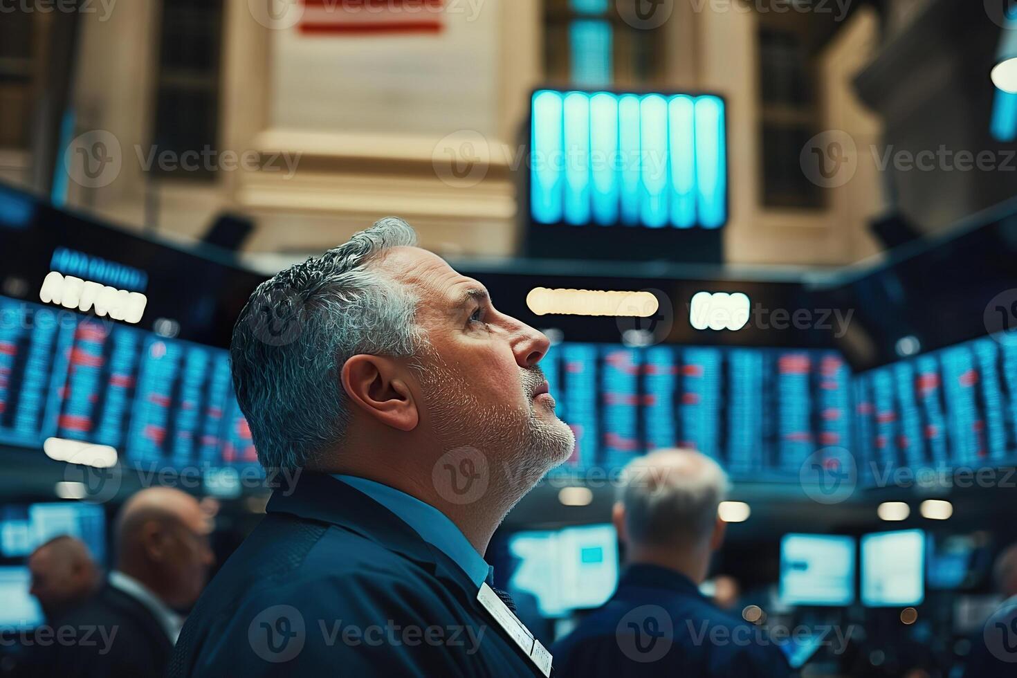 Traders engage with stock market data and monitor transactions on the exchange floor photo