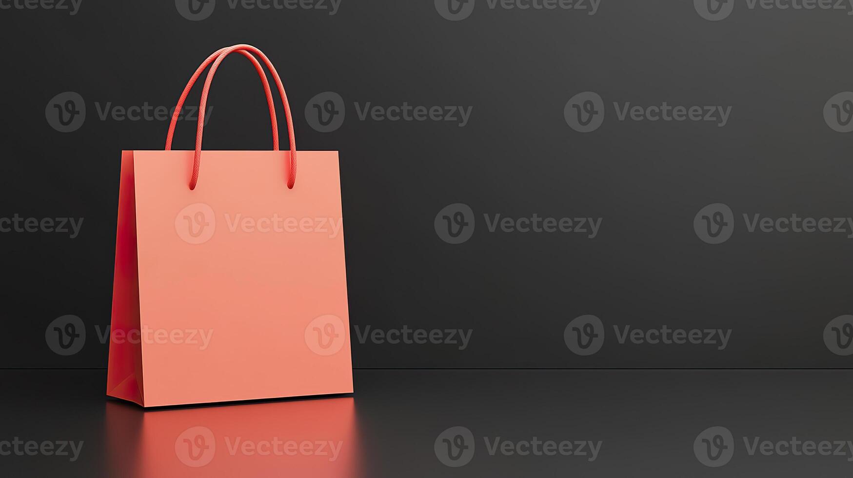 Empty red shopping bag on black background for autumn sales and promotions idea. photo