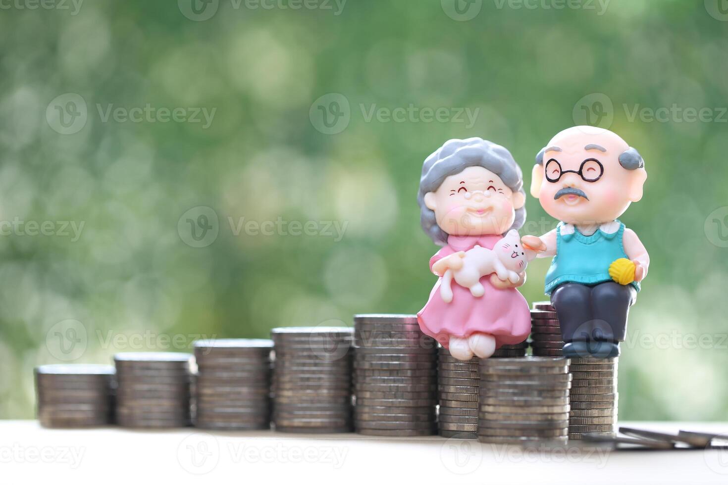 Mutual fund,Love couple senior and model house on natural green background, Save money for prepare in future and pension retirement concept photo