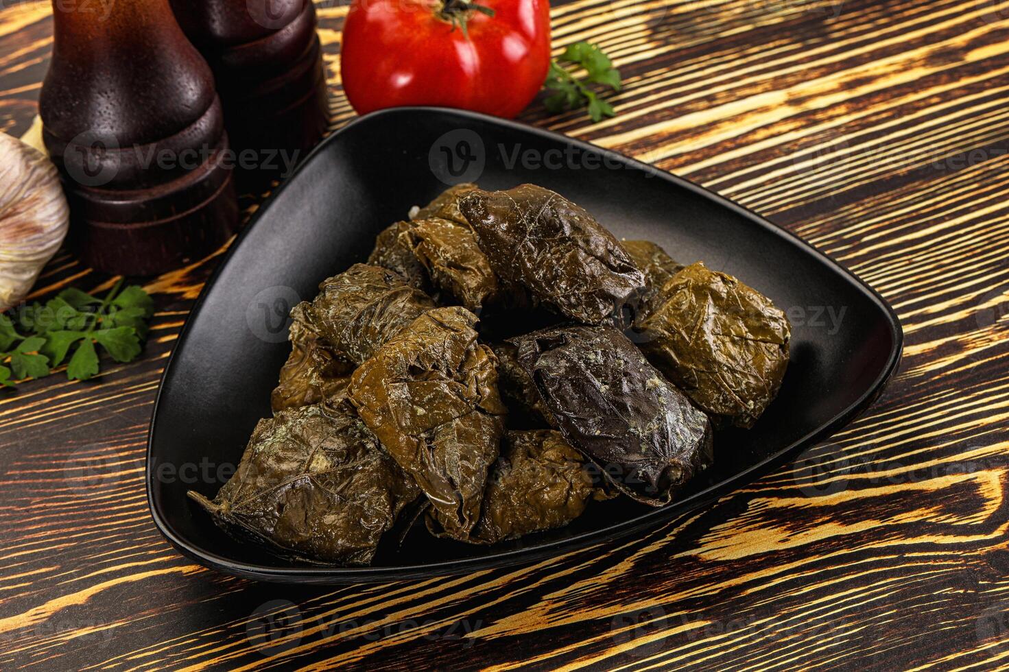Stuffed dolma - meat in grape leaves photo