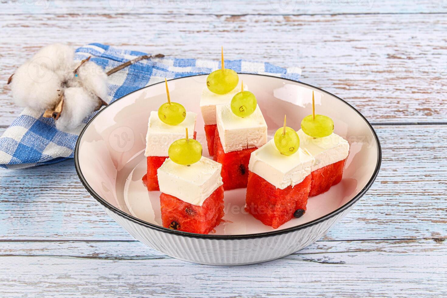 Watermelon with feta and grape photo