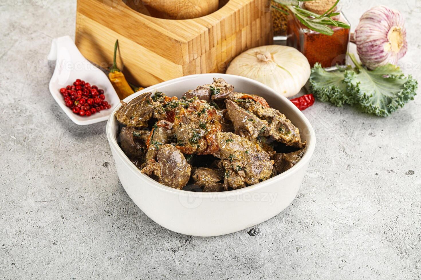 Chicken liver in cream sauce photo