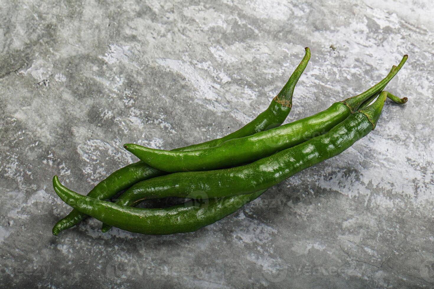 Hot and spicy green chili pepper photo