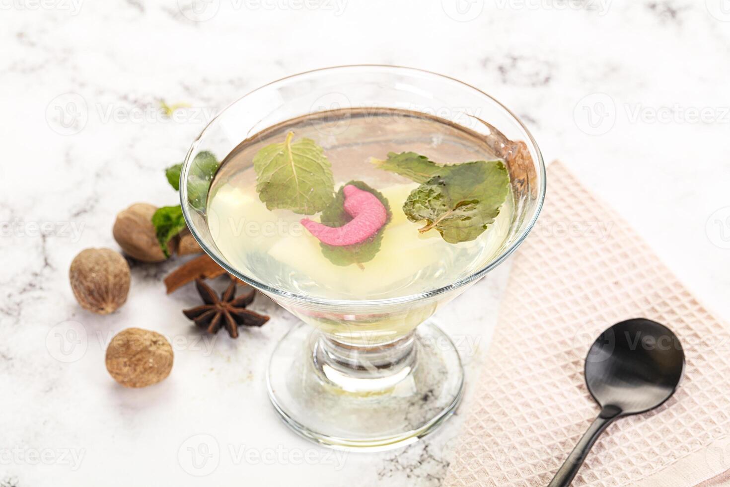 Sweet pineapple jelly with mint photo