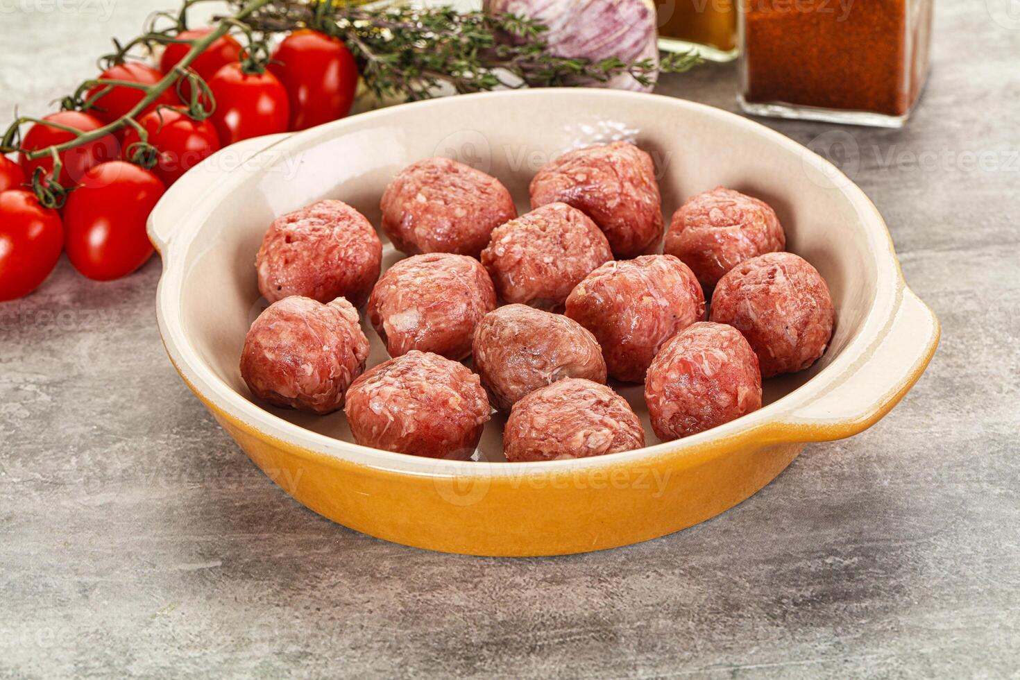 Uncooked raw beef meatball minced photo