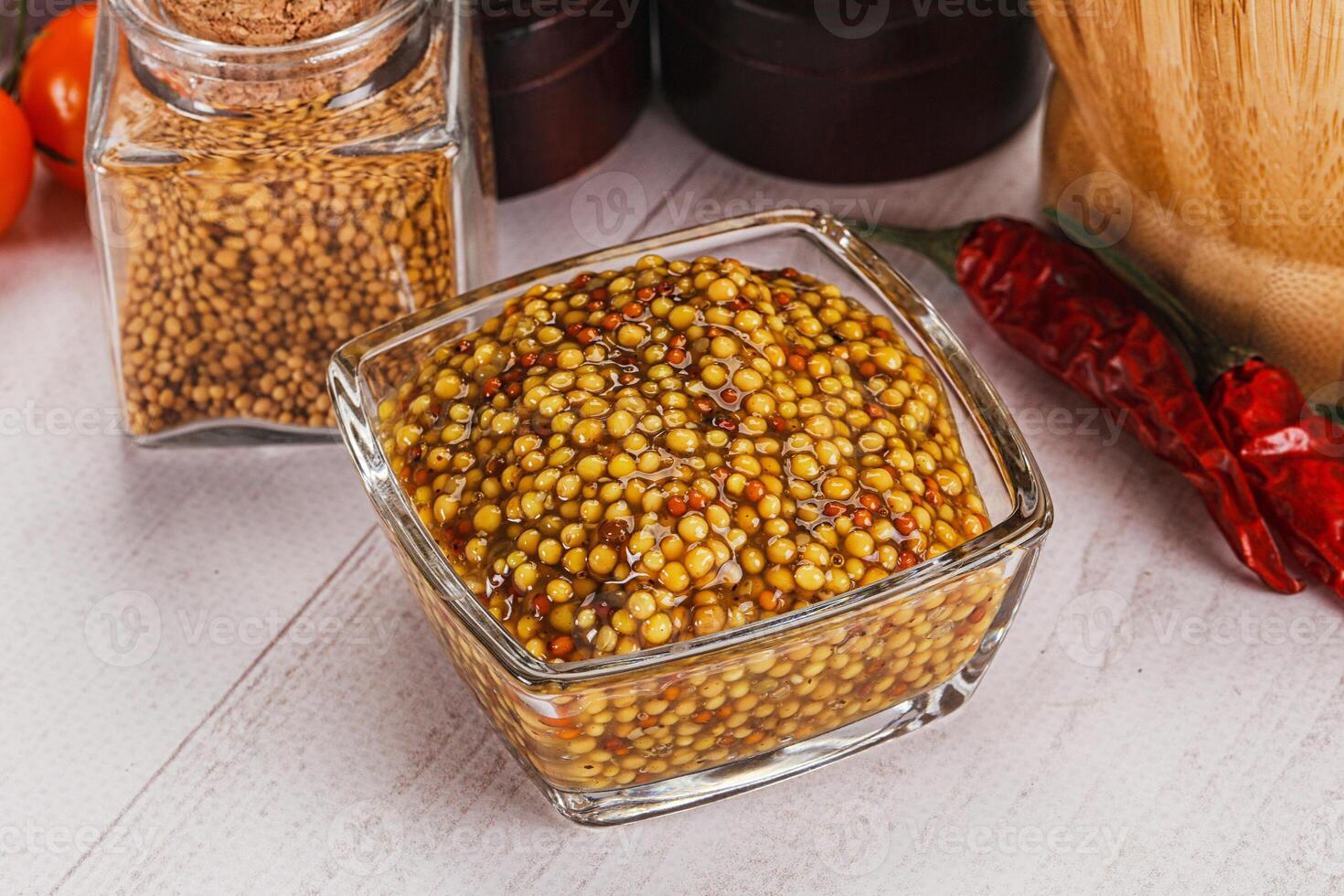 Spicy mustard sauce with seeds photo