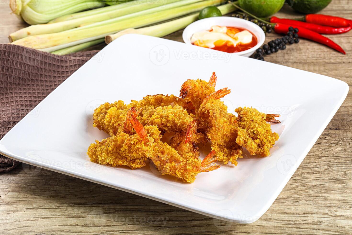 Golden deep prawn tempura wuth sauce photo