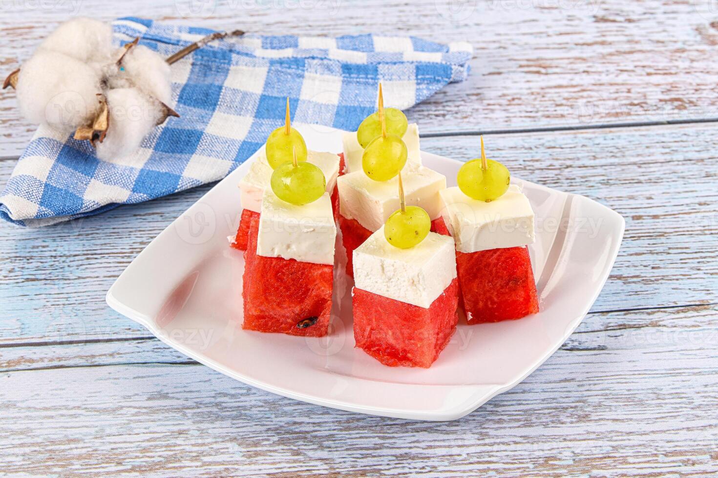 Watermelon with feta and grape photo