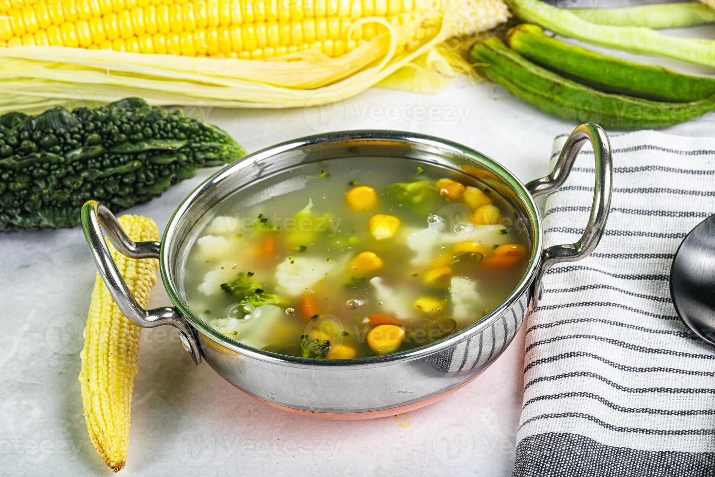 Soup with corn and broccoli photo