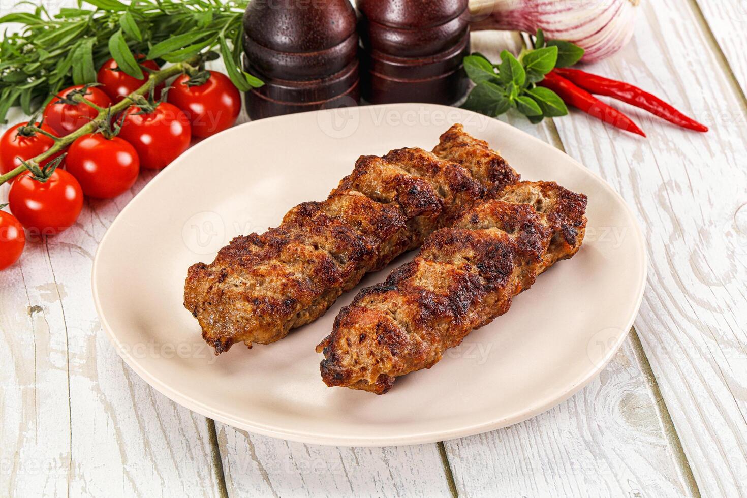 Chicken kebab minced meat and spices photo