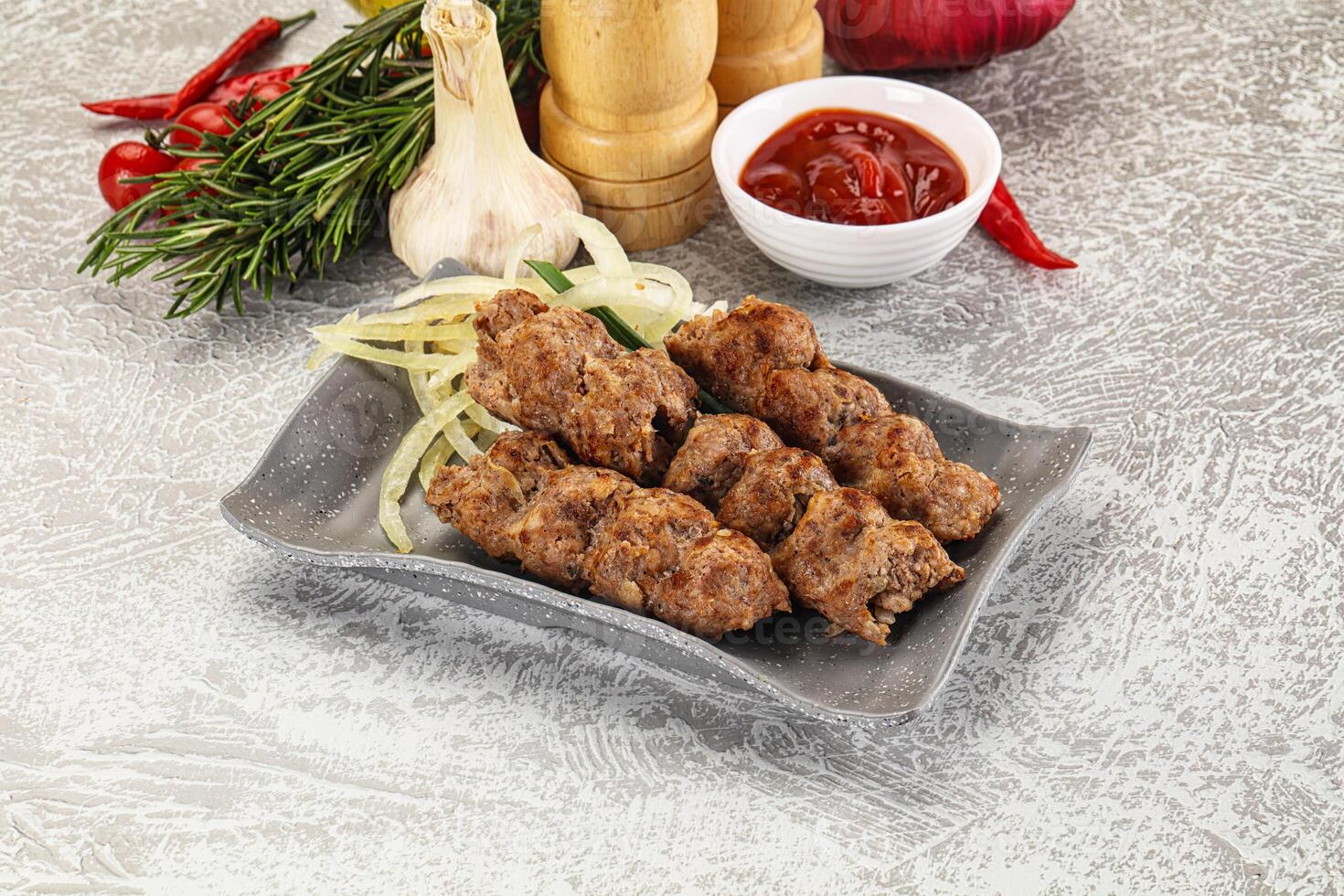 Beef kebab minced meat with onion photo
