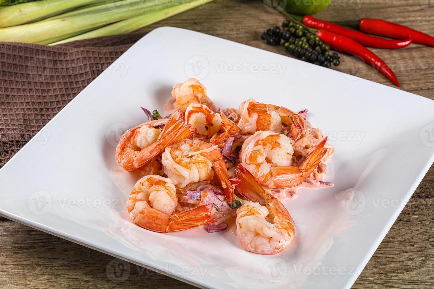 Shrimp cocktail with salad and sauce photo