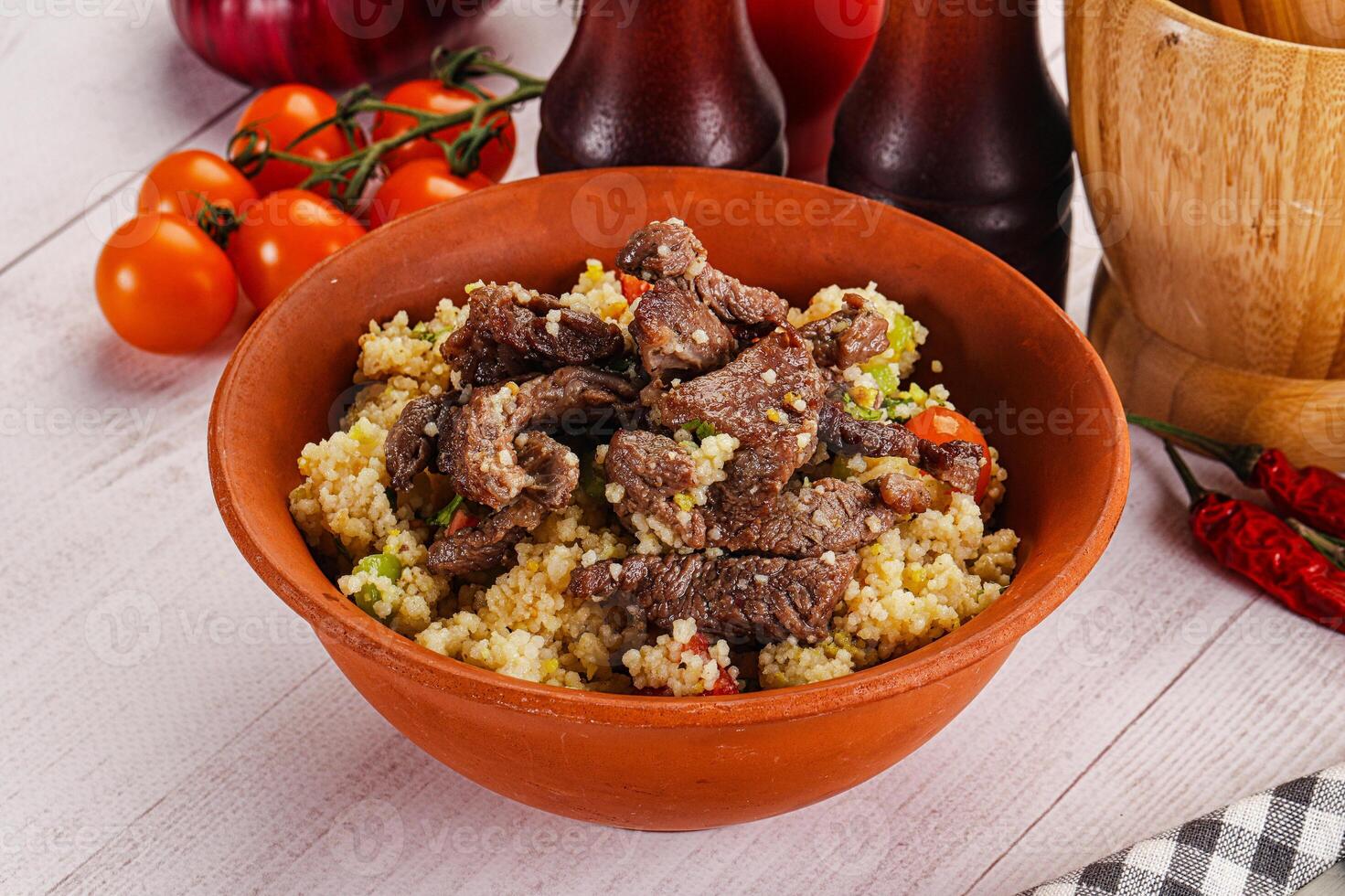 Traditional couscous with beef and vegetables photo