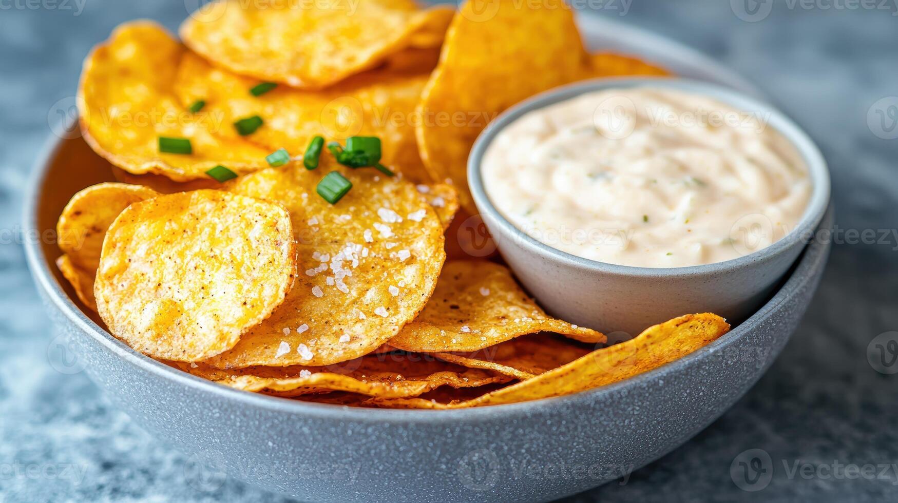 Delicious nachos with creamy dip photo