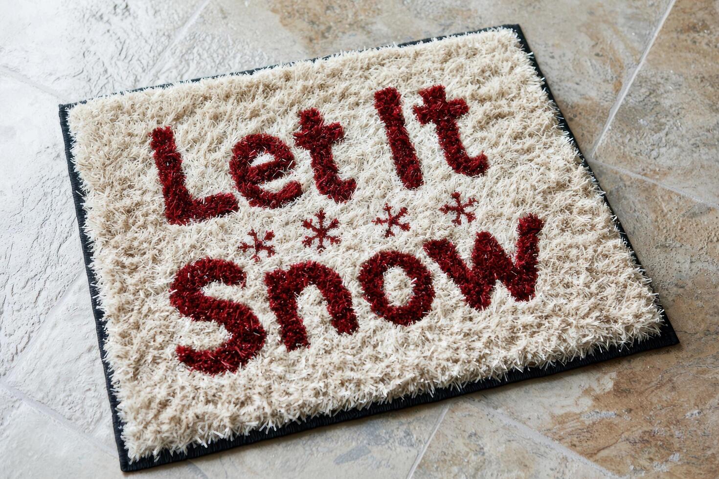 Decorative winter doormat with let it snow text photo