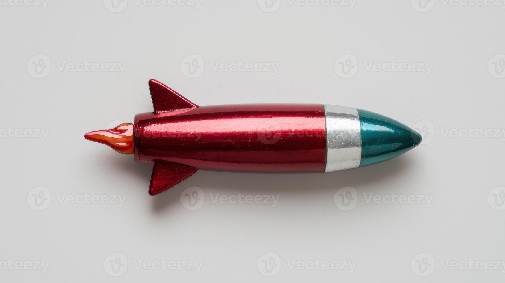Retro rocket toy on white background photo