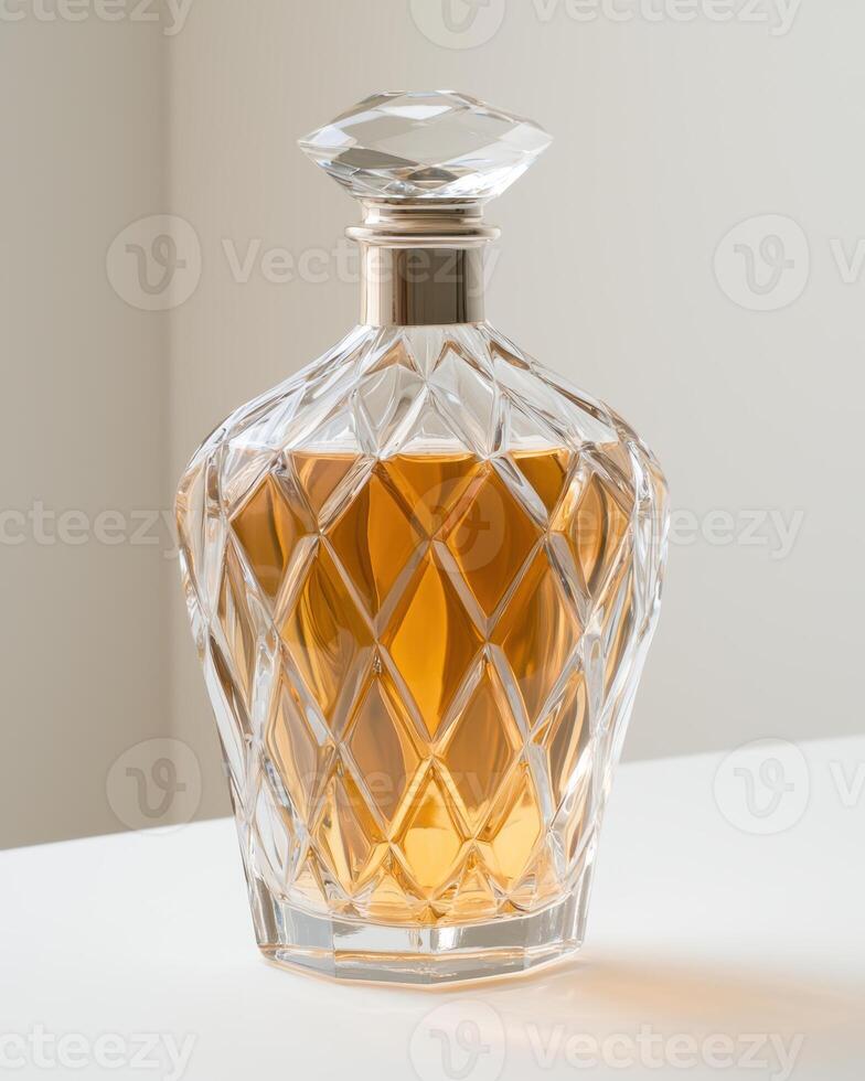 Elegant crystal decanter with amber liquid photo