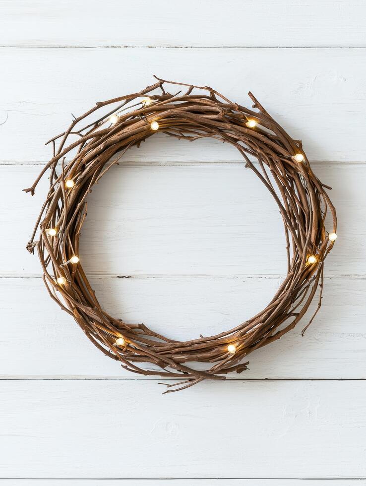 Rustic twig wreath with warm lights photo