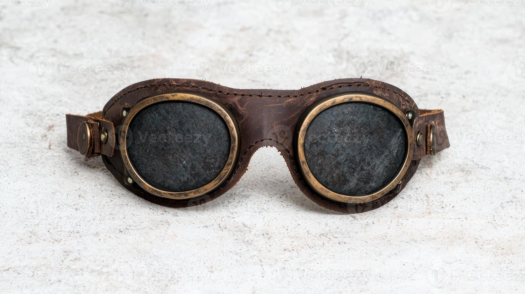 Vintage leather goggles with round lenses photo