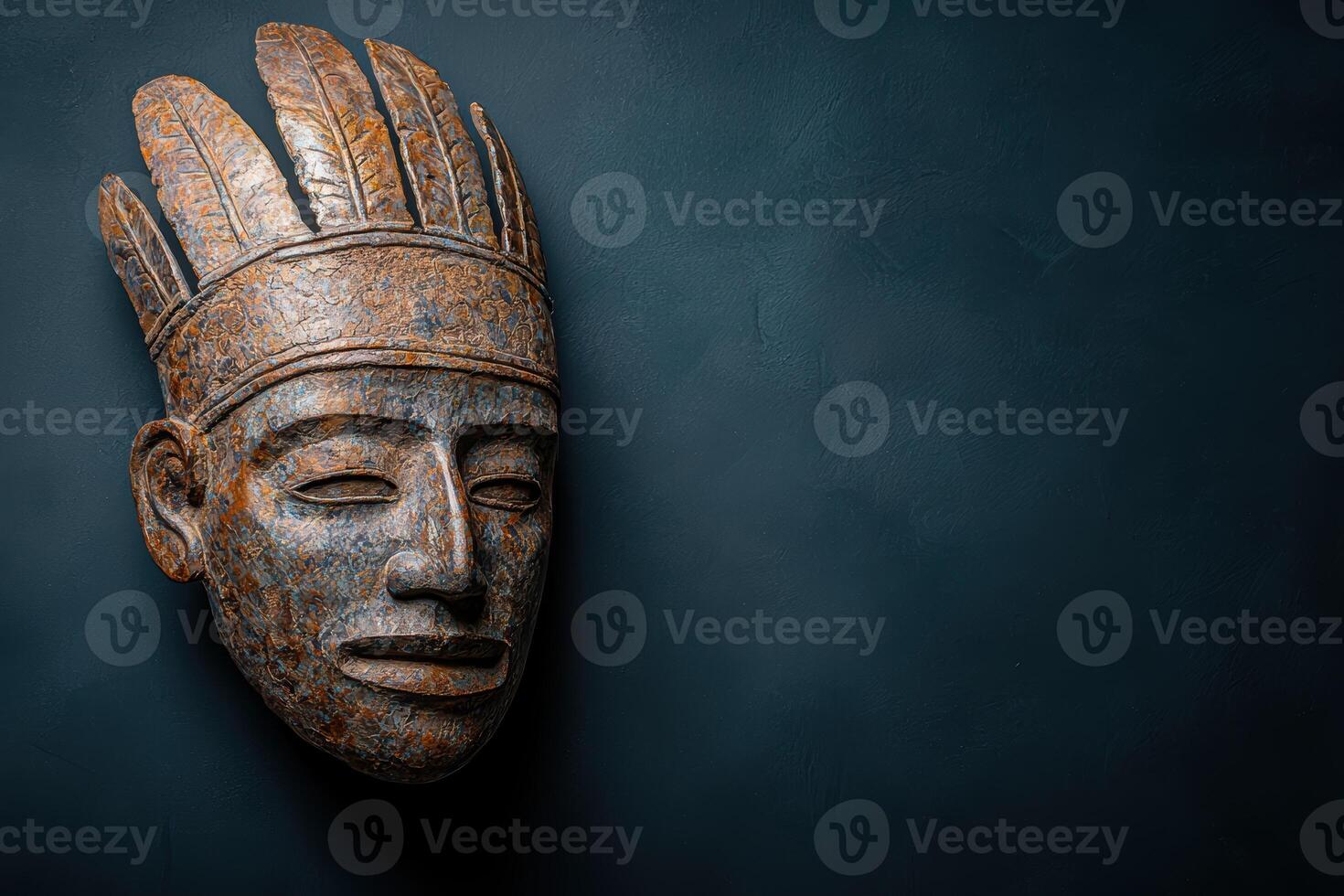 Carved wooden mask with intricate patterns photo